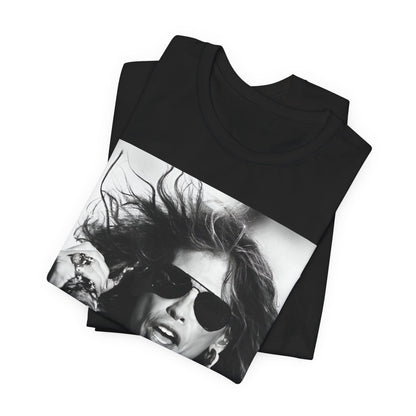 A black graphic t-shirt featuring a black and white photo of Aerosmith's Steven Tyler with his signature scarf and microphone, captured during a dynamic performance.