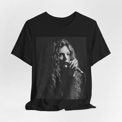 A black graphic t-shirt featuring a graphic or photo of Lorde performing live.