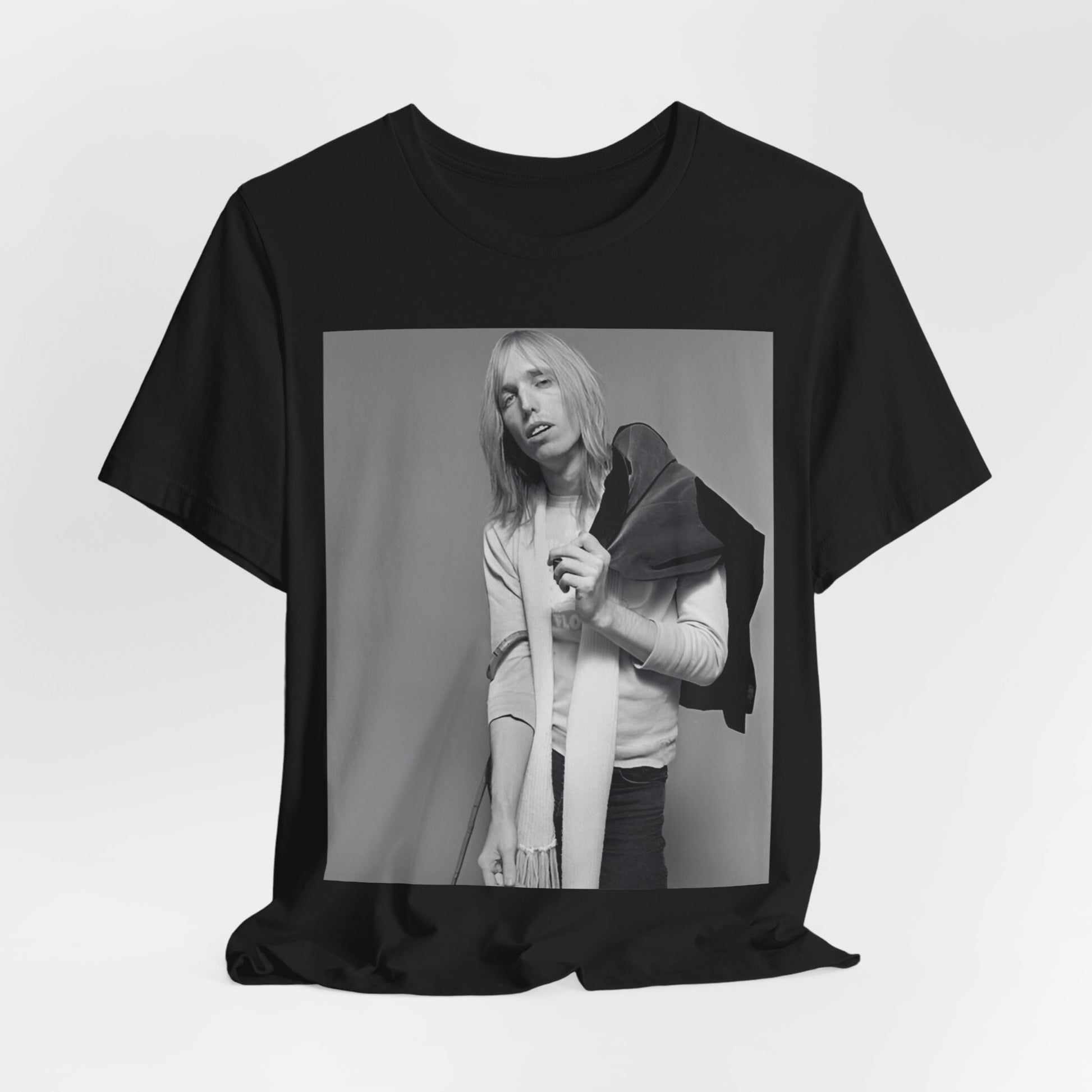 A black graphic t-shirt featuring a modern rock essential graphic of Tom Petty.