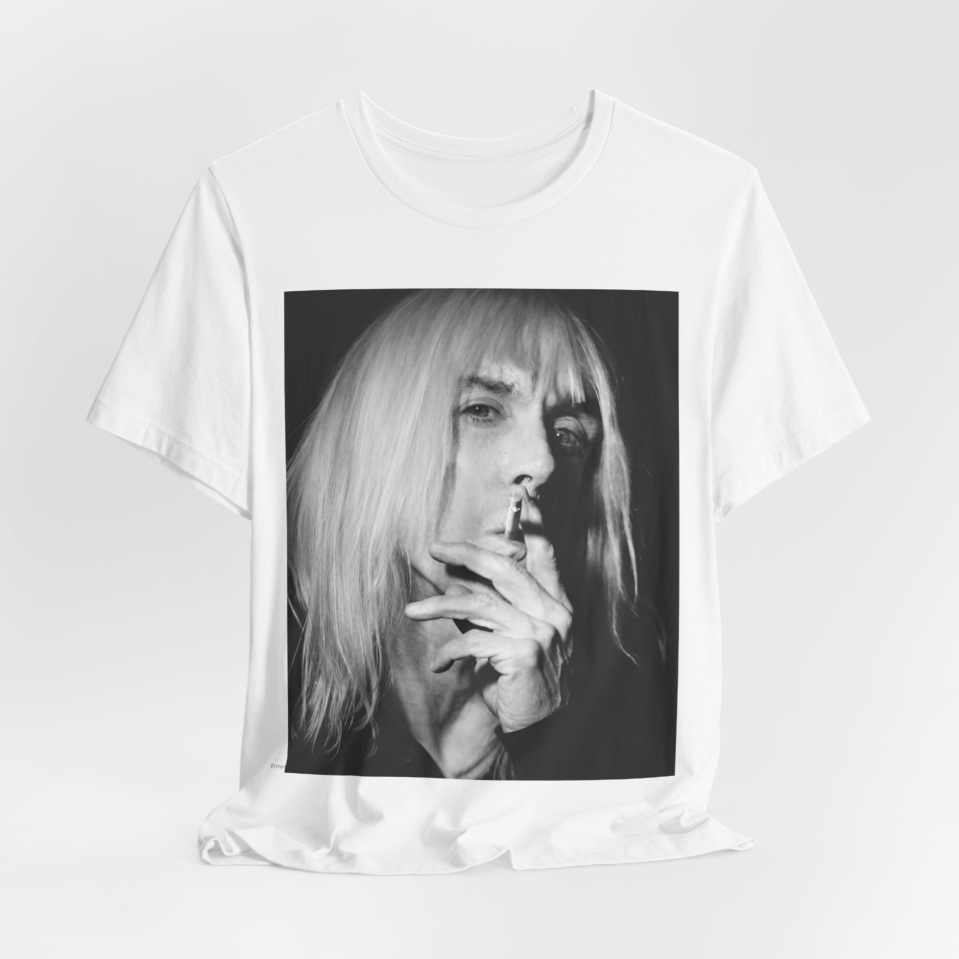 A black graphic t-shirt featuring a black and white graphic or photo of Iggy Pop holding a cigar.