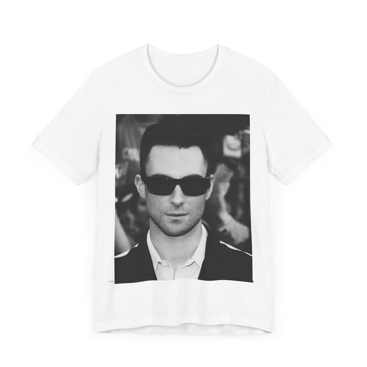 A black and white high-fashion photoshoot photo of Adam Levine, frontman of Maroon 5, looking confidently at the camera.