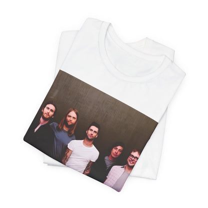 A black cotton Maroon 5 t-shirt featuring a graphic of an artistic, emotional heart design.