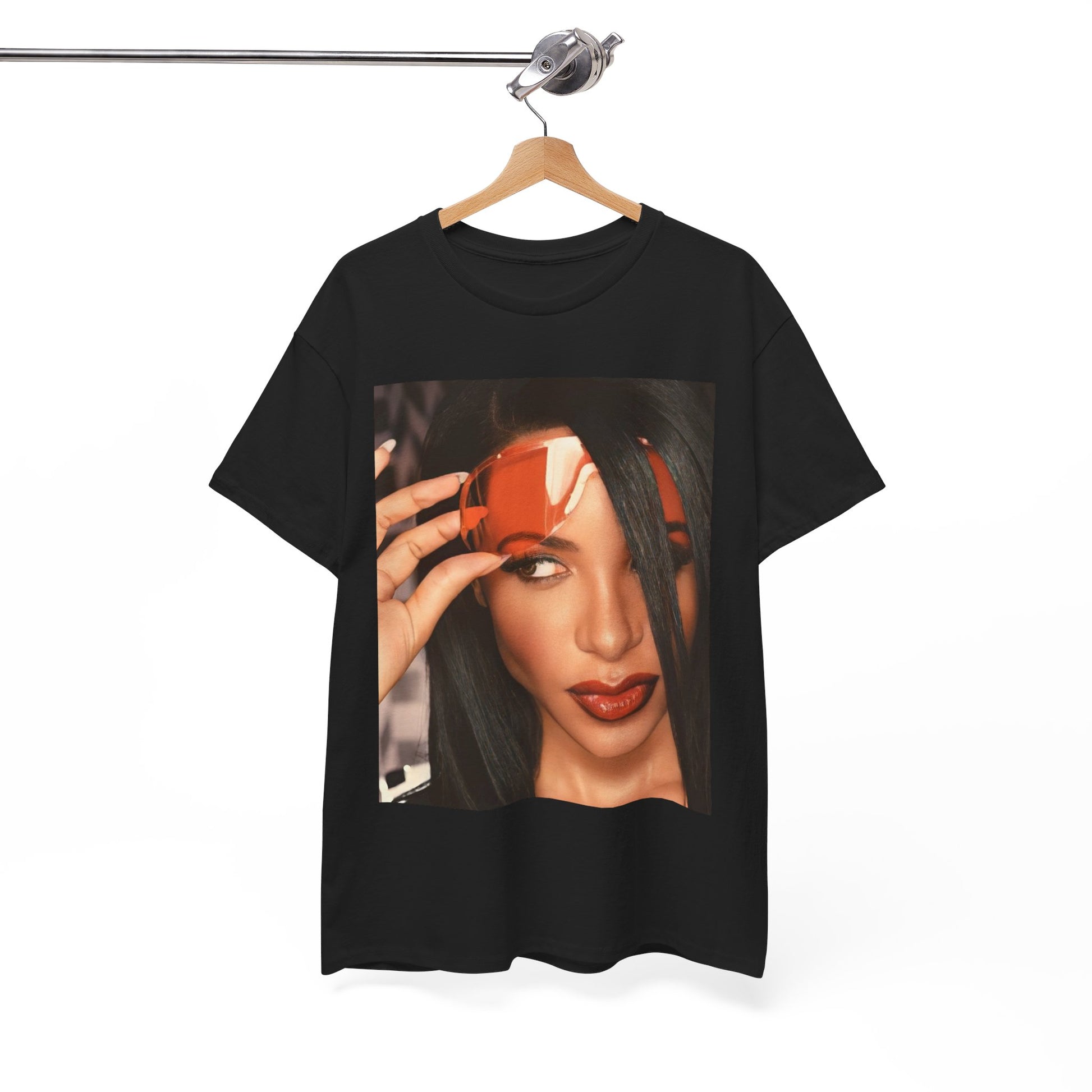 A black graphic t-shirt featuring a 90s hip hop tribute graphic of Aaliyah.