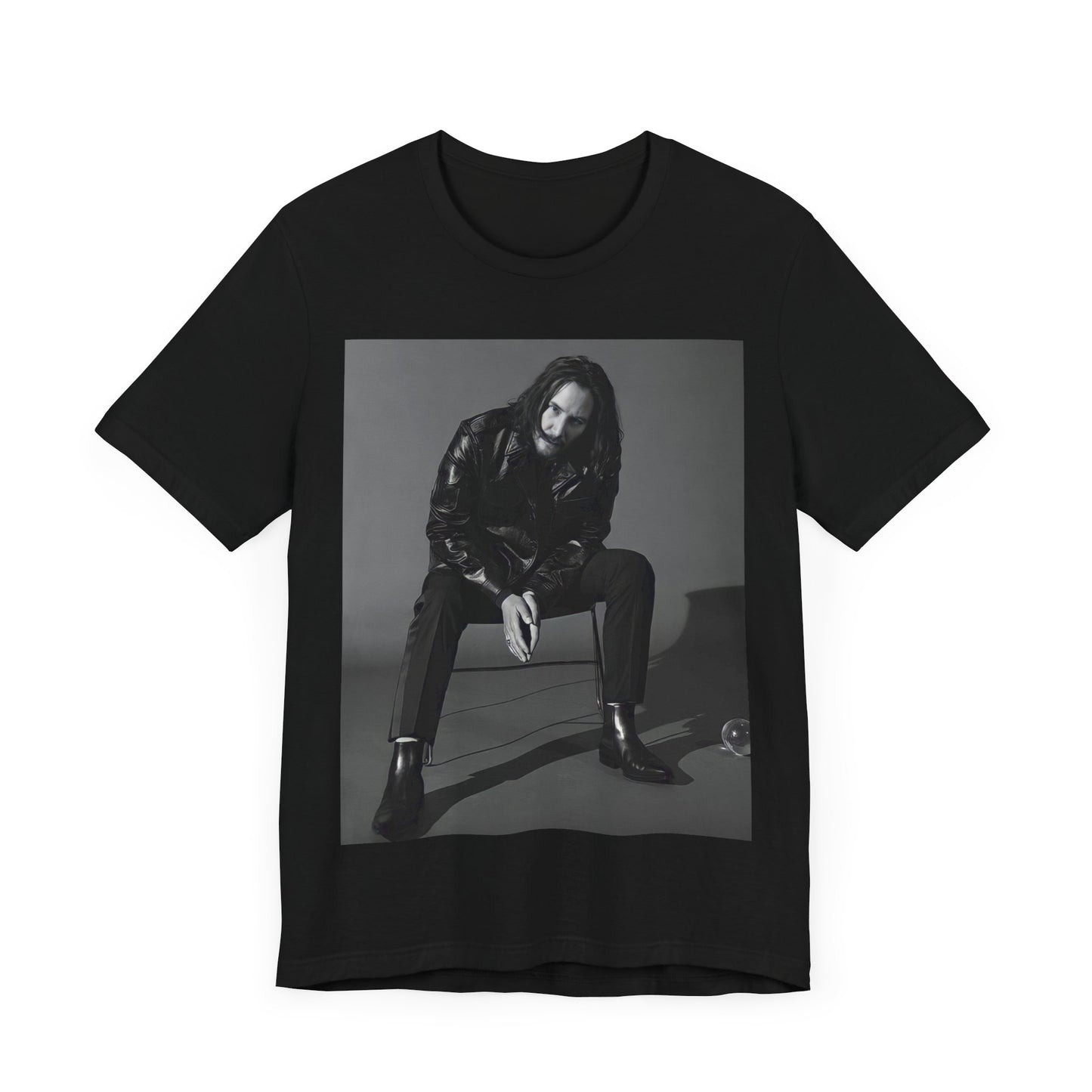 A black graphic t-shirt featuring a graphic of Keanu Reeves as John Wick.