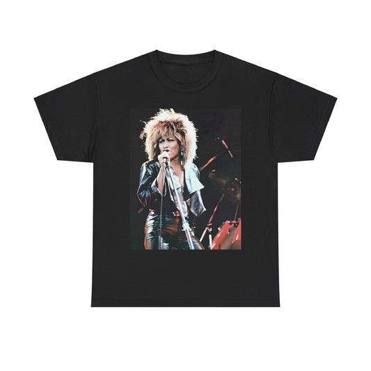 A black graphic t-shirt featuring a 90s graphic or photo of Tina Turner performing live on stage.