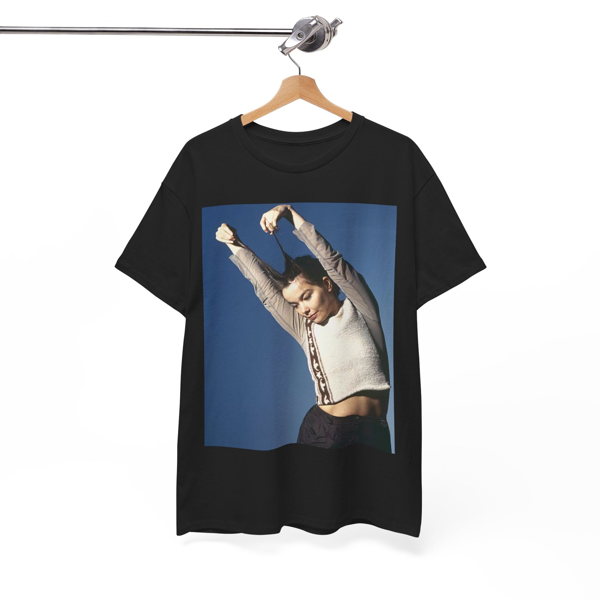 A black graphic t-shirt featuring a graphic of Bjork, designed with a futuristic or timeless aesthetic, labeling it a 'future classic'.