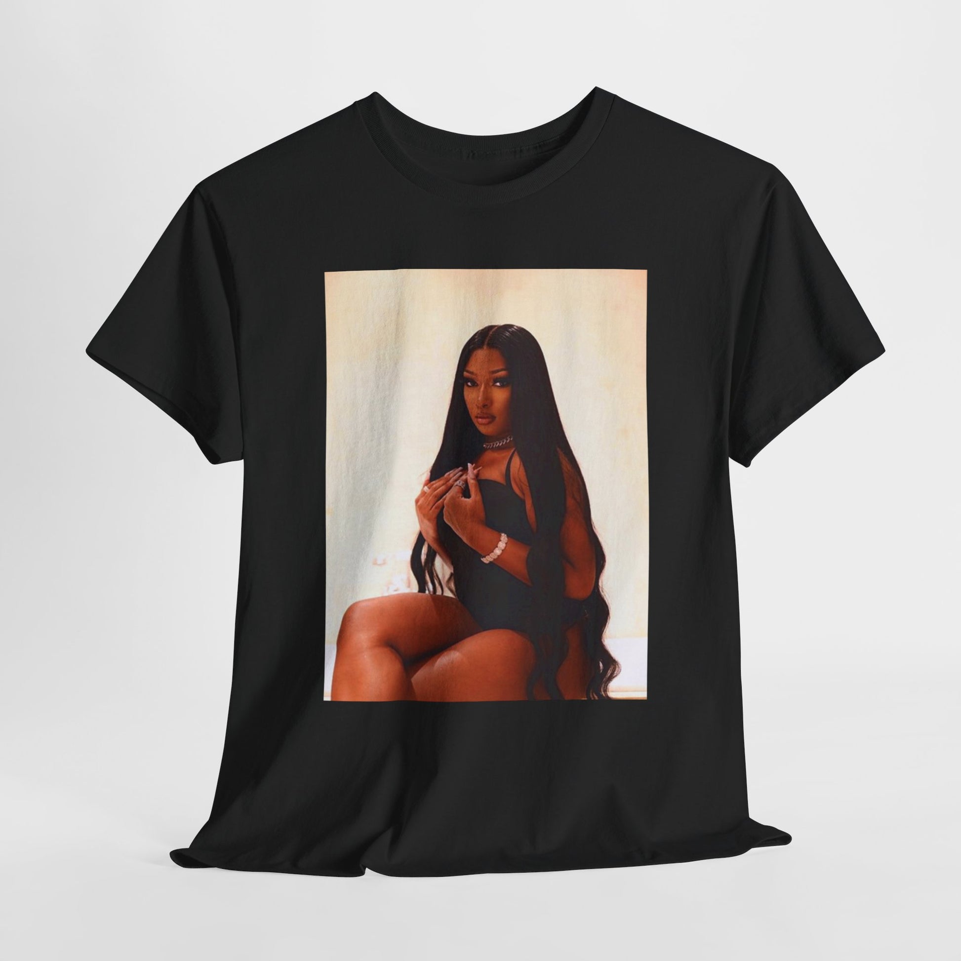 A black graphic t-shirt featuring a graphic of Megan Thee Stallion as the Queen of Rap.
