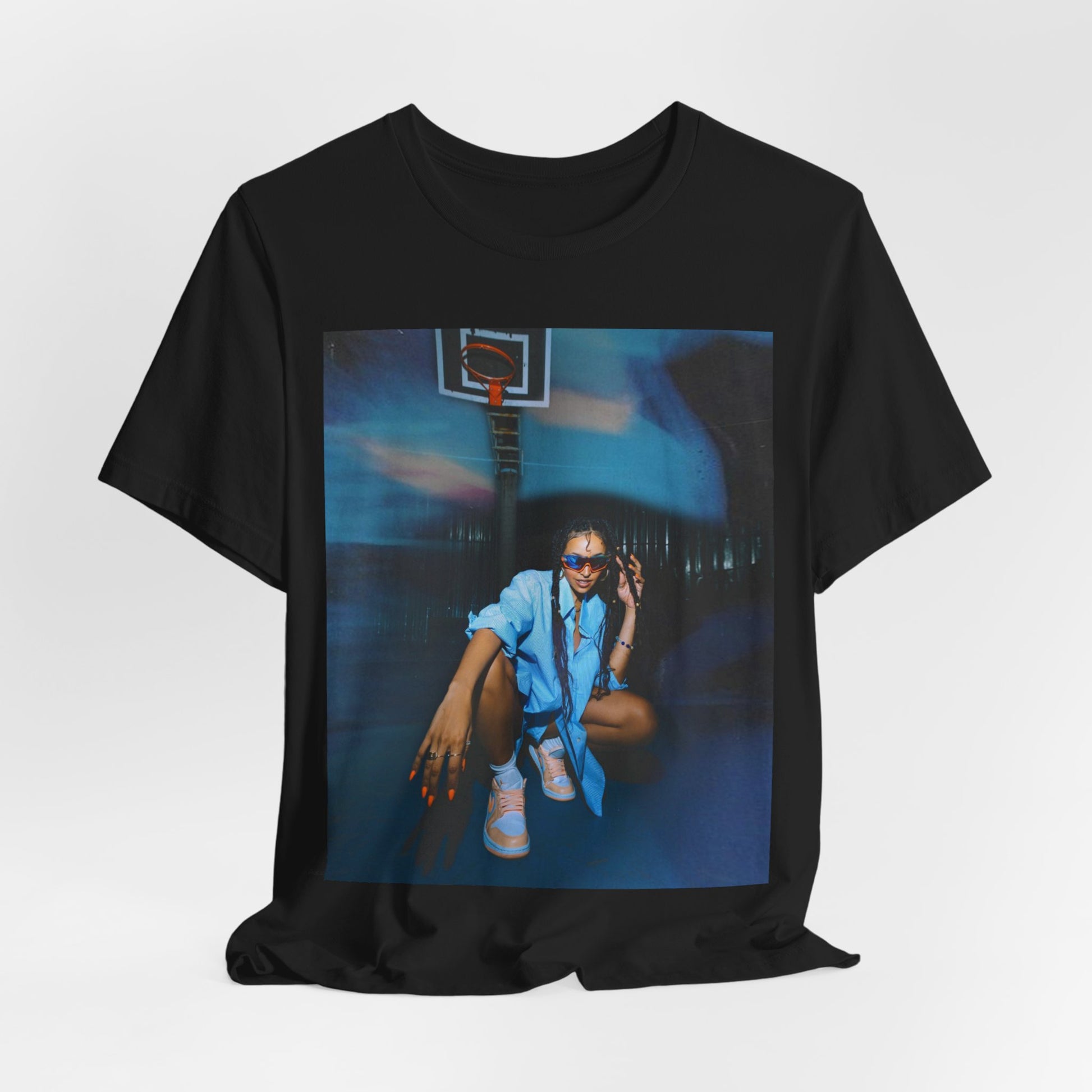 A black graphic t-shirt featuring an indie R&B streetwear graphic of Tinashe.