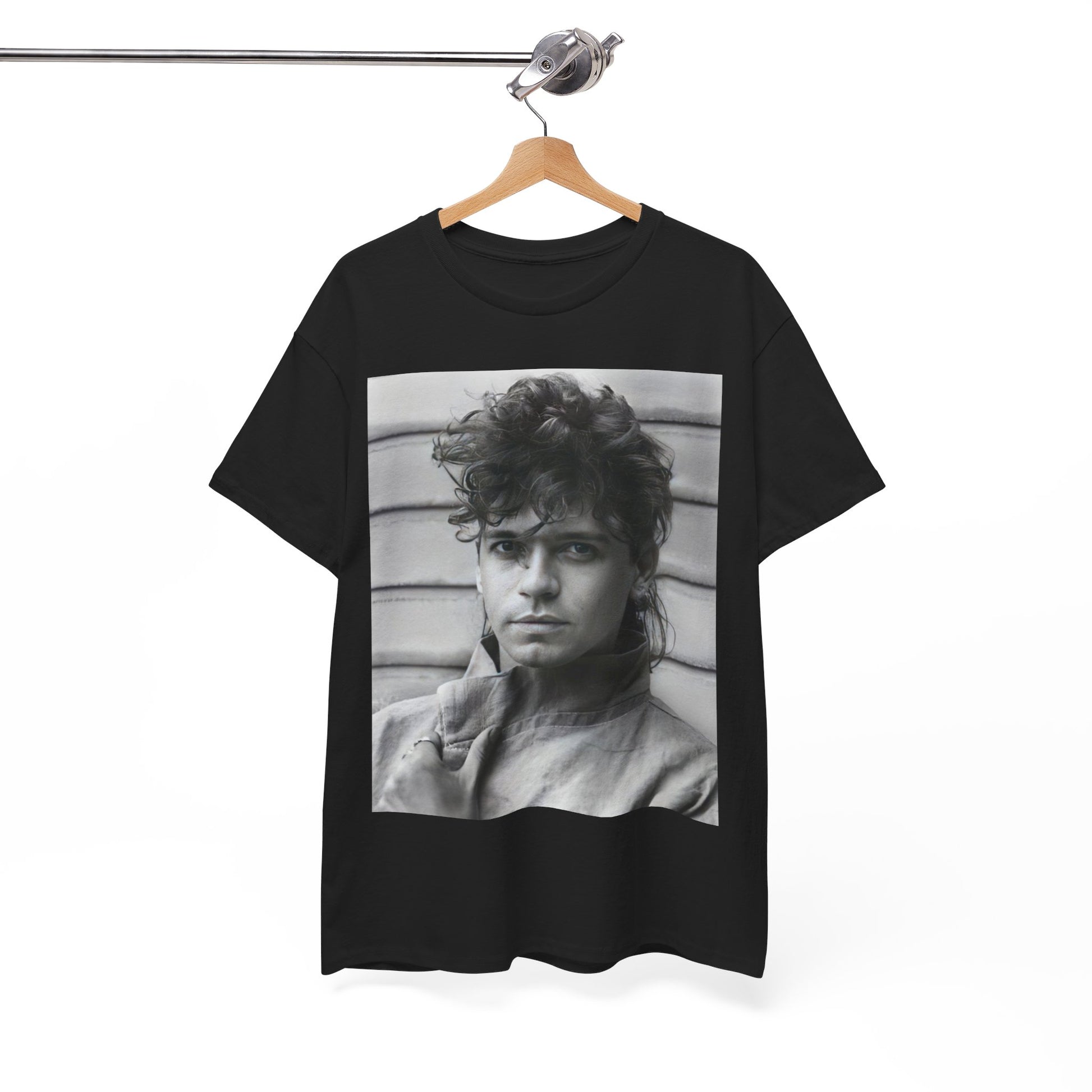 A black graphic t-shirt featuring a retro black and white graphic or photo of Michael Hutchence from INXS.