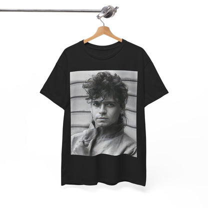 A black graphic t-shirt featuring a retro black and white graphic or photo of Michael Hutchence from INXS.