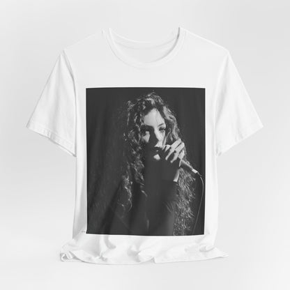A black graphic t-shirt featuring a graphic or photo of Lorde performing live.