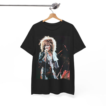 A black graphic t-shirt featuring a 90s graphic or photo of Tina Turner performing live on stage.