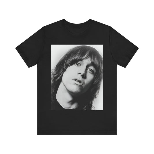 A black graphic t-shirt featuring a vintage graphic related to Iggy Pop's 'The Passenger' song or era.