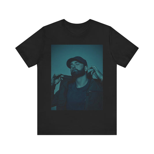 A black graphic t-shirt featuring a graphic of Eminem as a 'Rap God'.
