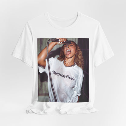 A black graphic t-shirt featuring an aesthetic graphic of Tinashe with a 'Nasty' vibe.