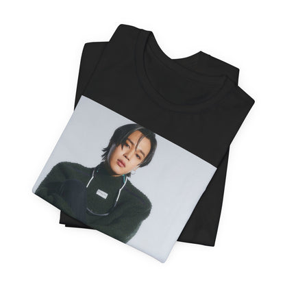 A black graphic t-shirt featuring a modern K-Pop essential graphic of Jimin.