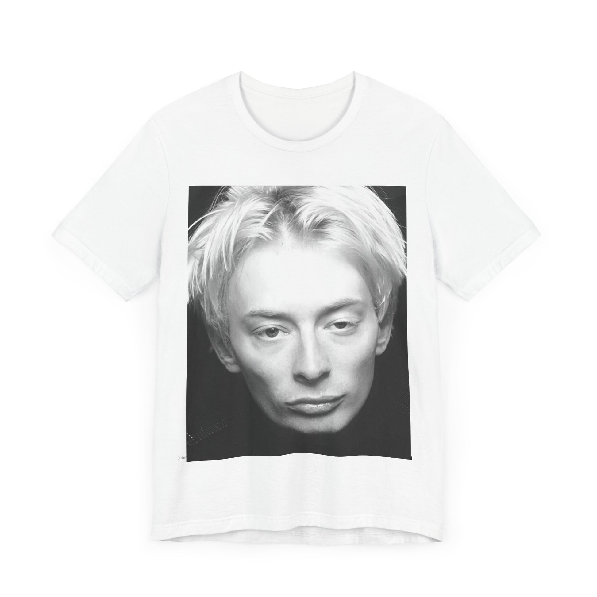 A black graphic t-shirt featuring a 90s black and white portrait photo of Thom Yorke from Radiohead.