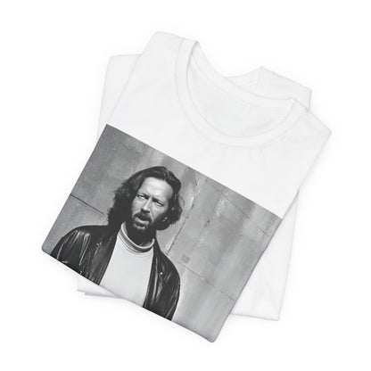 A black graphic t-shirt featuring a retro graphic related to Eric Clapton's 'Cocaine' song or era.