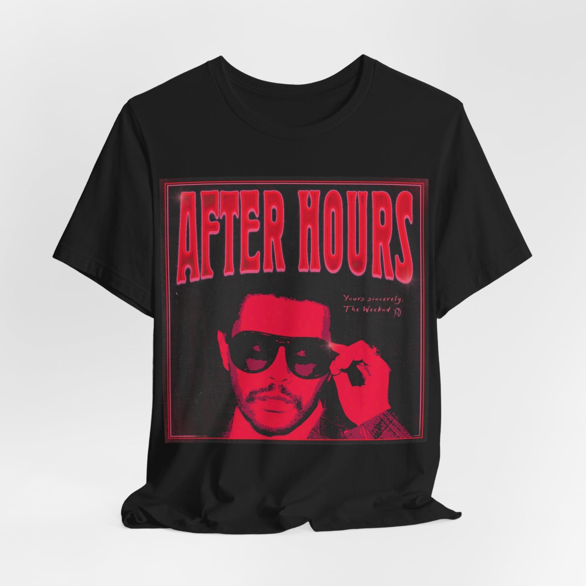 A black graphic t-shirt featuring a retro graphic related to The Weeknd's 'After Hours' album.