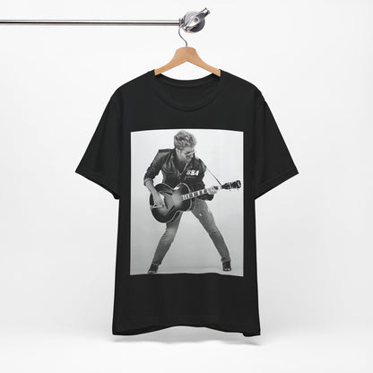 A black graphic t-shirt featuring a graphic of George Michael with a guitar.
