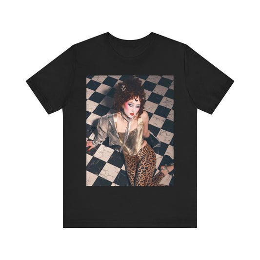 A black graphic t-shirt featuring a graphic of Chappell Roan, evoking "Naked in Manhattan" vibes.