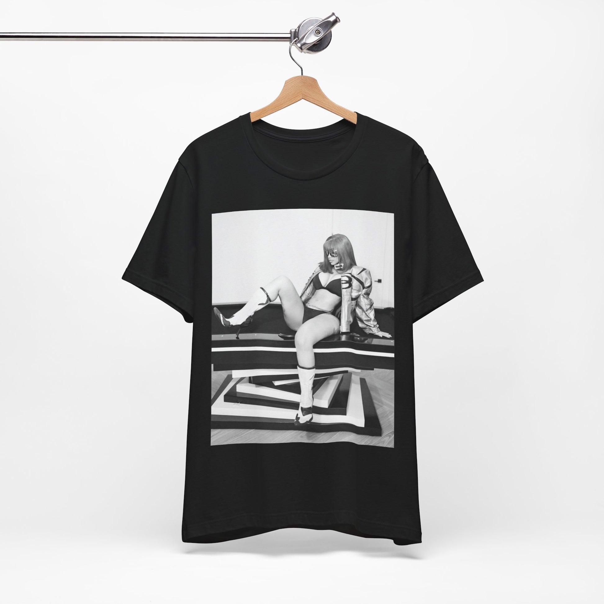 A black graphic t-shirt featuring an artistic or aesthetic graphic of Cardi B in a hip hop style.