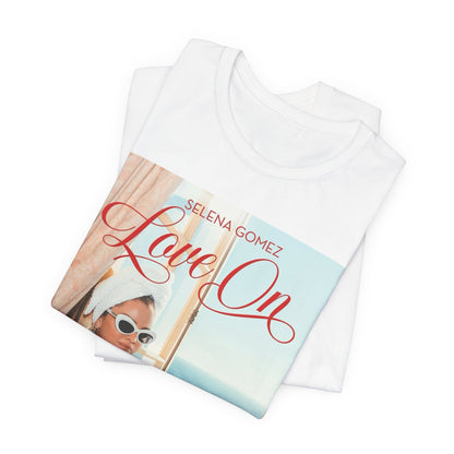 A black graphic t-shirt featuring a graphic related to Selena Gomez's 'Love On' song.