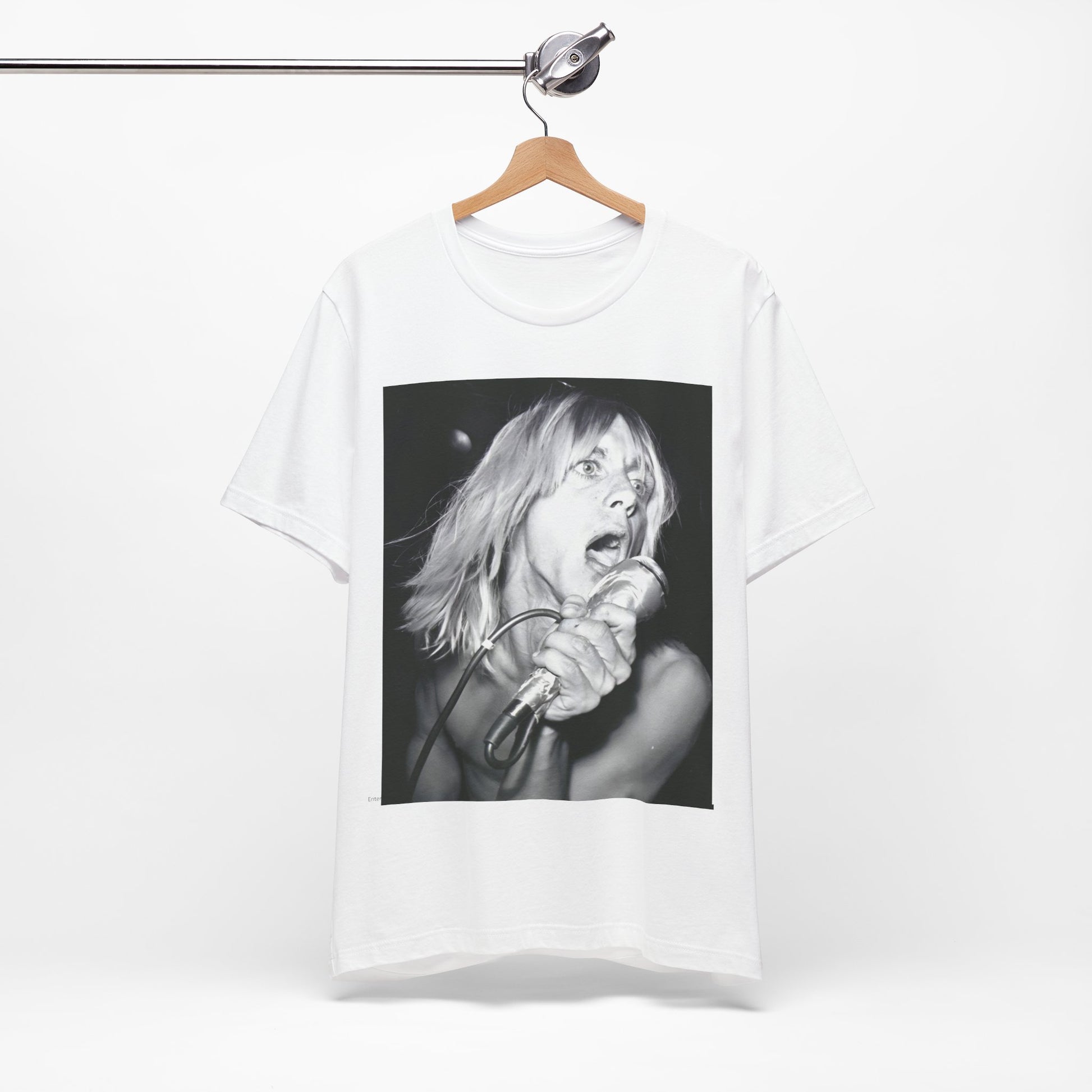 A black graphic t-shirt featuring a graphic of Iggy Pop as the Godfather of Punk, performing live.