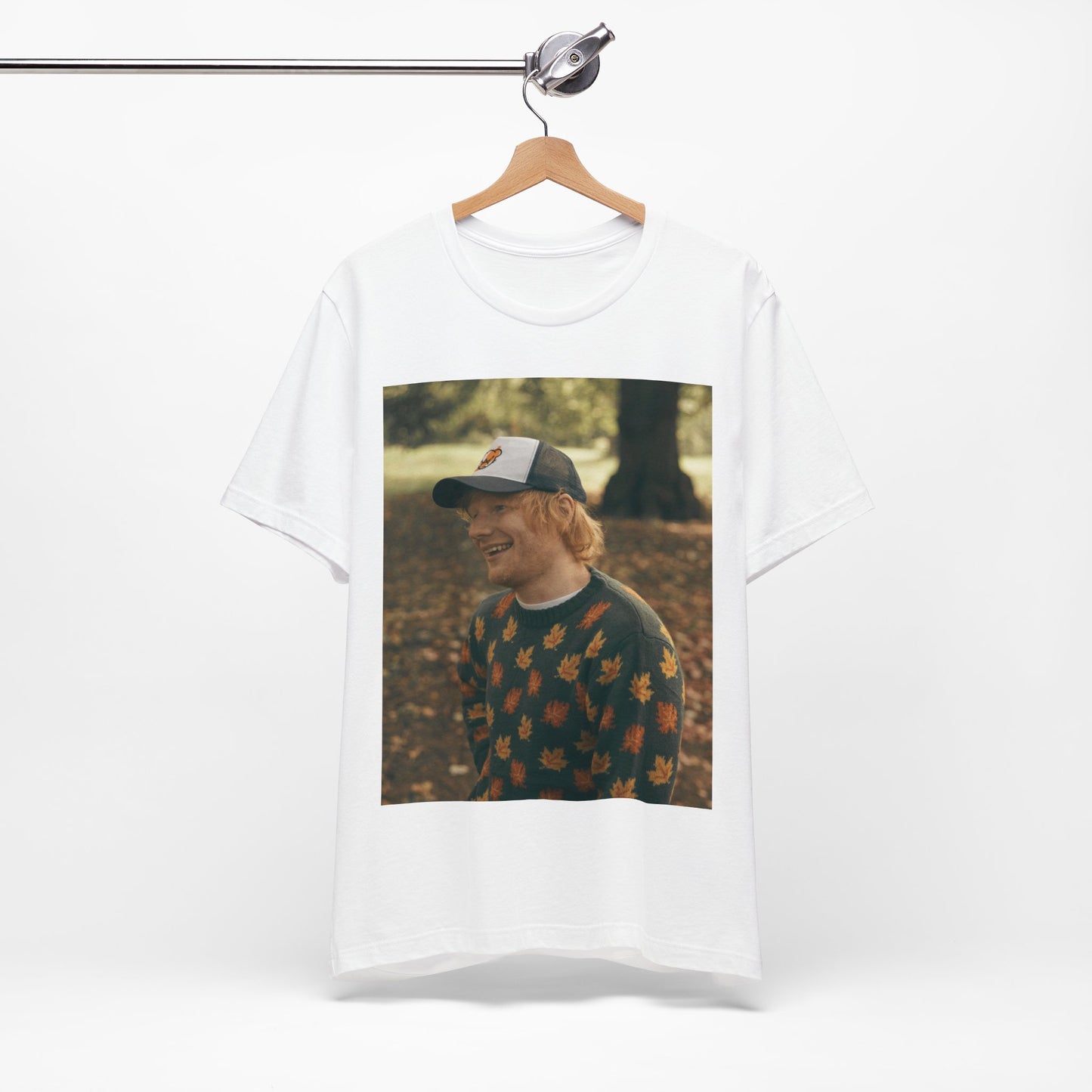 A black graphic t-shirt featuring a graphic related to Ed Sheeran's 'Shape of You' song or era.