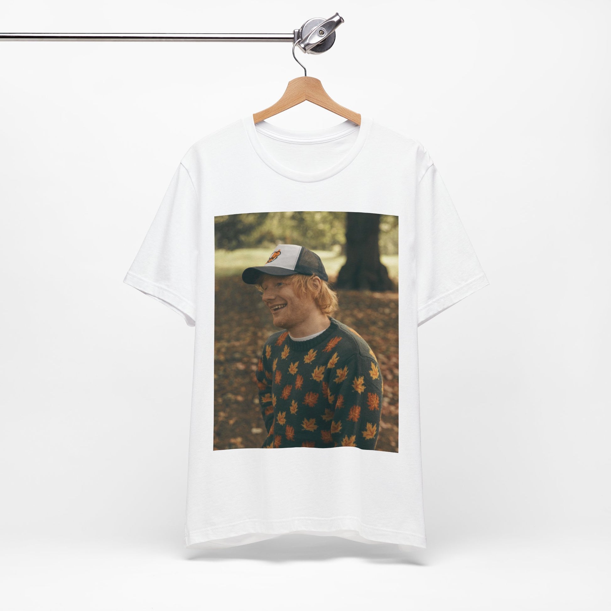 A black graphic t-shirt featuring a graphic related to Ed Sheeran's 'Shape of You' song or era.