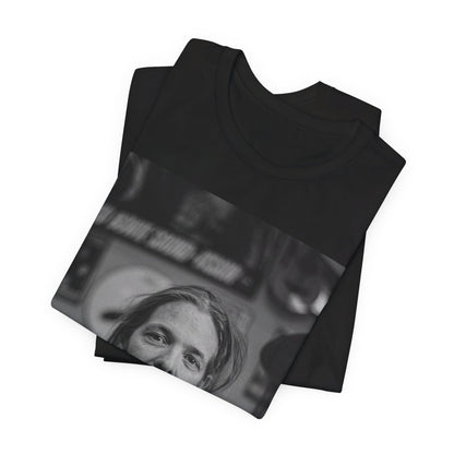 A black graphic t-shirt featuring a tribute graphic for Taylor Hawkins of Foo Fighters.