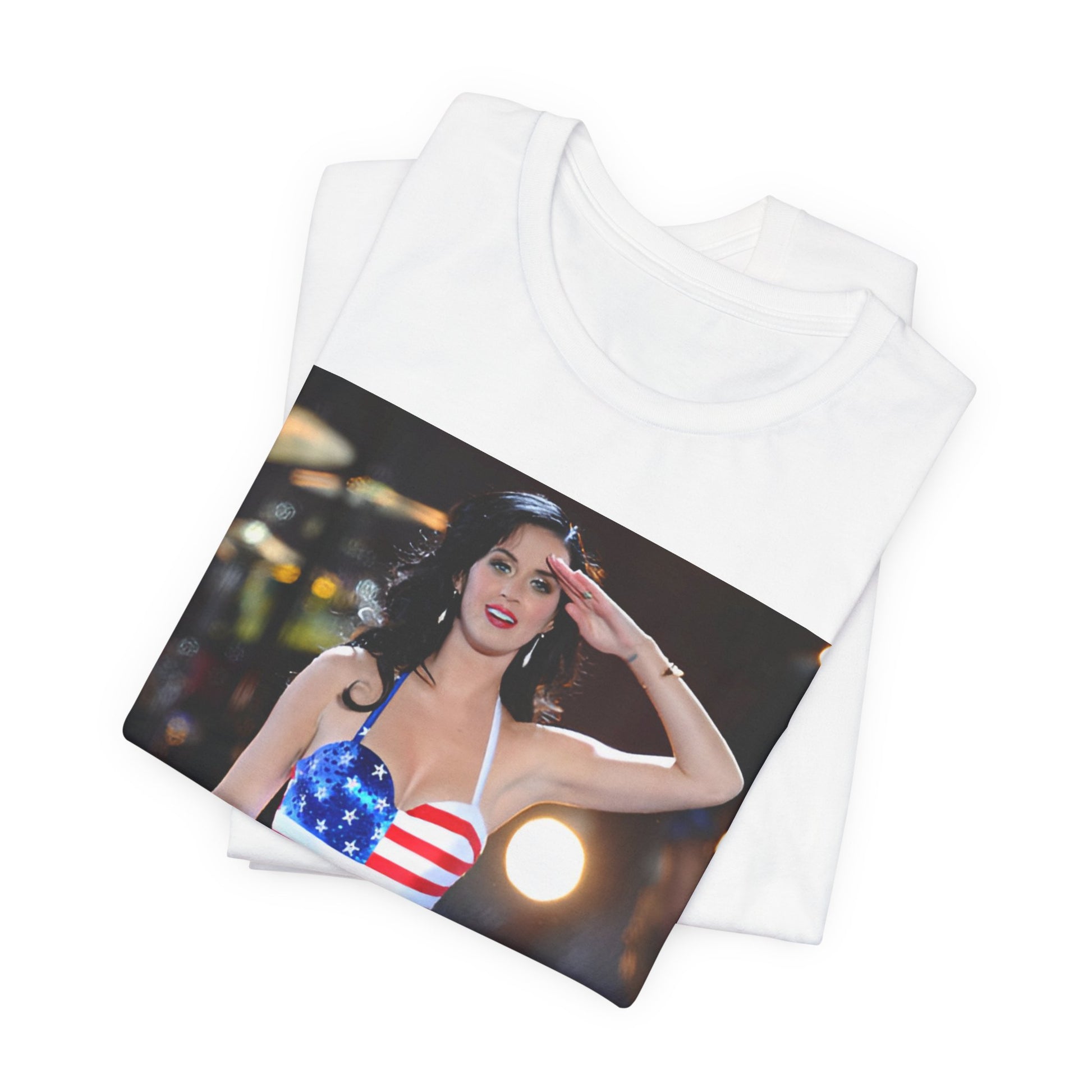 A black graphic t-shirt featuring a vintage graphic related to Katy Perry's 'Firework' song or era.