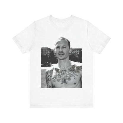A black graphic t-shirt featuring a black and white graphic or photo portrait of Chester Bennington from Linkin Park.