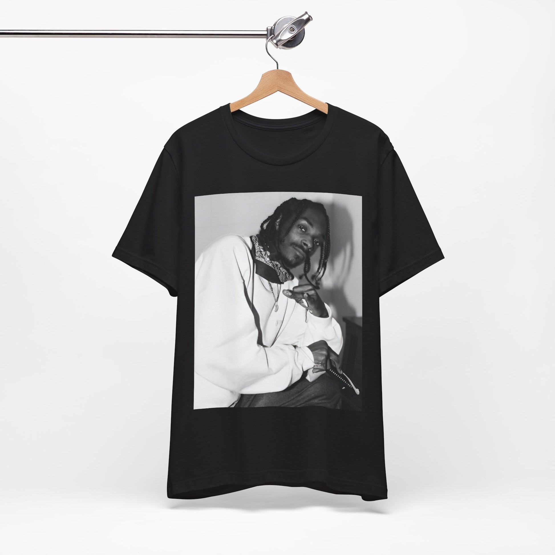 A black graphic t-shirt featuring a black and white hip hop graphic or photo of Snoop Dogg.