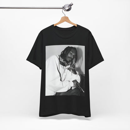 A black graphic t-shirt featuring a black and white hip hop graphic or photo of Snoop Dogg.