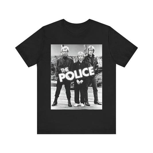 A black graphic t-shirt featuring an 80s pop rock aesthetic black and white graphic of The Police.