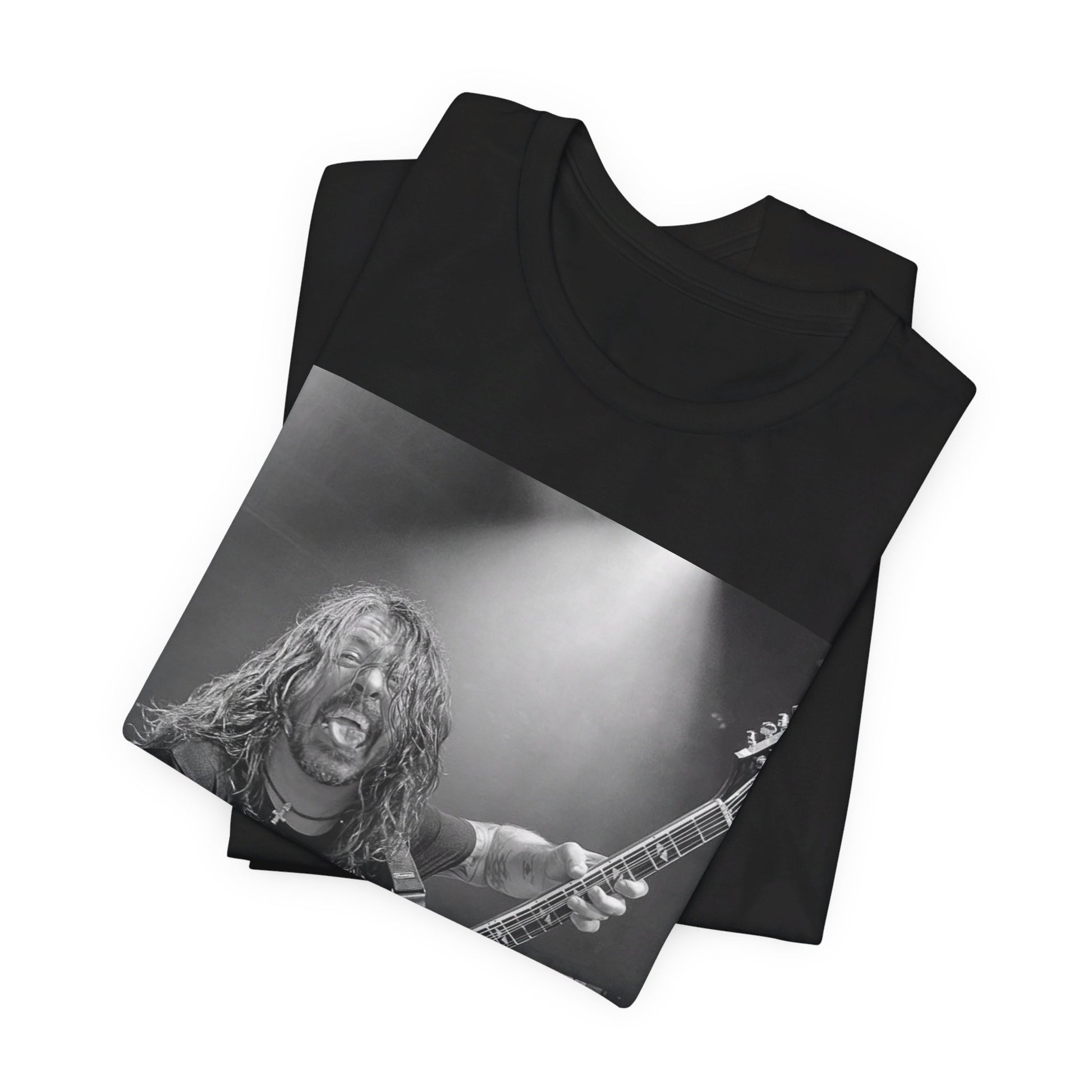A black graphic t-shirt featuring a graphic of Dave Grohl from Foo Fighters playing guitar in concert.