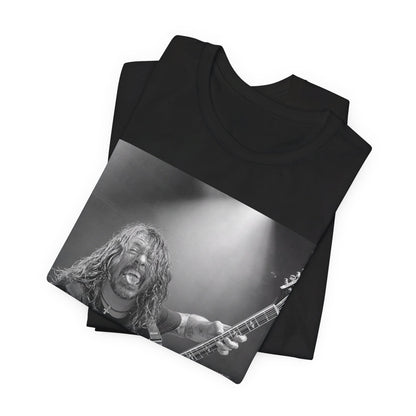 A black graphic t-shirt featuring a graphic of Dave Grohl from Foo Fighters playing guitar in concert.