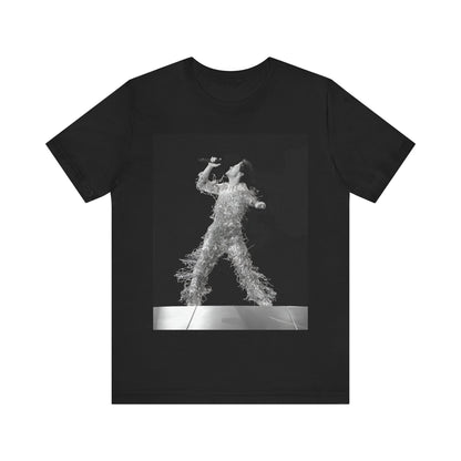 A black graphic t-shirt featuring a boxy pop aesthetic graphic of Harry Styles.