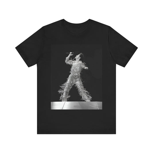 A black graphic t-shirt featuring a boxy pop aesthetic graphic of Harry Styles.