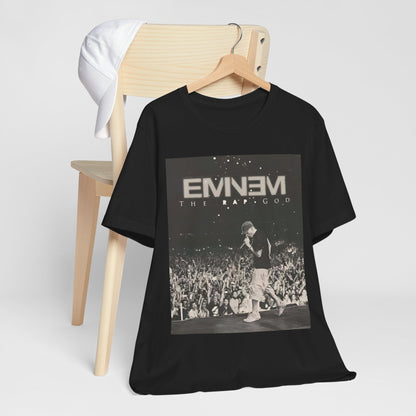 A black graphic t-shirt featuring a graphic or photo of Eminem performing live on tour.