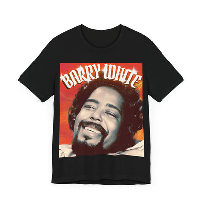 A black graphic t-shirt featuring a graphic of Barry White, emphasizing his iconic soulful presence from the 1970s.