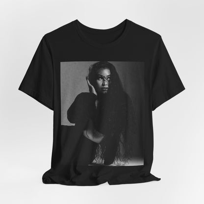A black graphic t-shirt featuring a black and white graphic or photo of Nicki Minaj as a glamour queen.