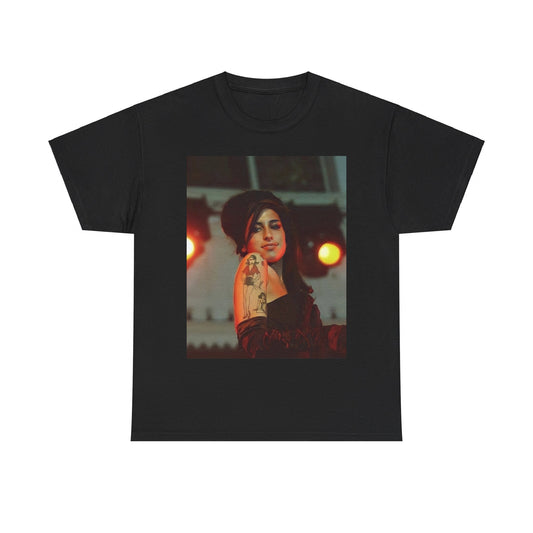 A black graphic t-shirt featuring a stylized graphic of Amy Winehouse, possibly with a crown or 'R&B Queen' text, emphasizing her soulful presence.