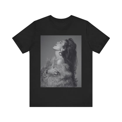 A black graphic t-shirt featuring a black and white portrait photo of Miley Cyrus.