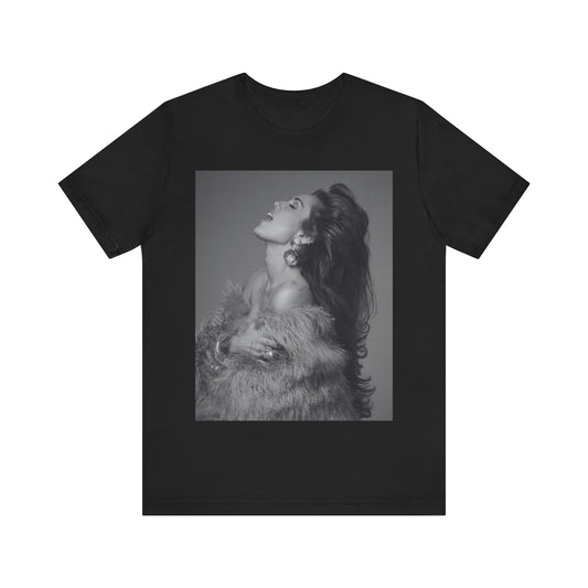 A black graphic t-shirt featuring a black and white portrait photo of Miley Cyrus.