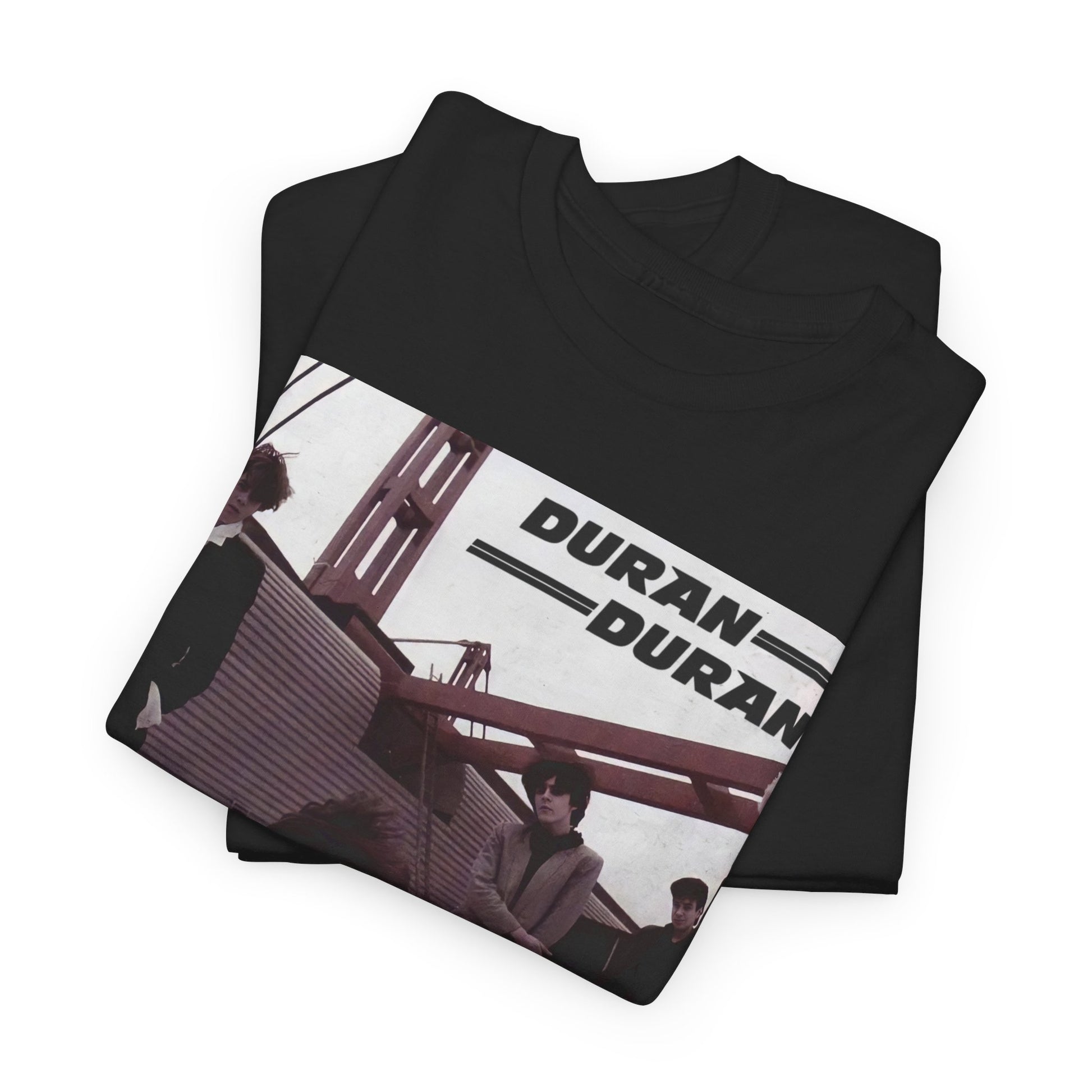 A black graphic t-shirt featuring a graphic related to Duran Duran's 'Hungry Like the Wolf' song or era.