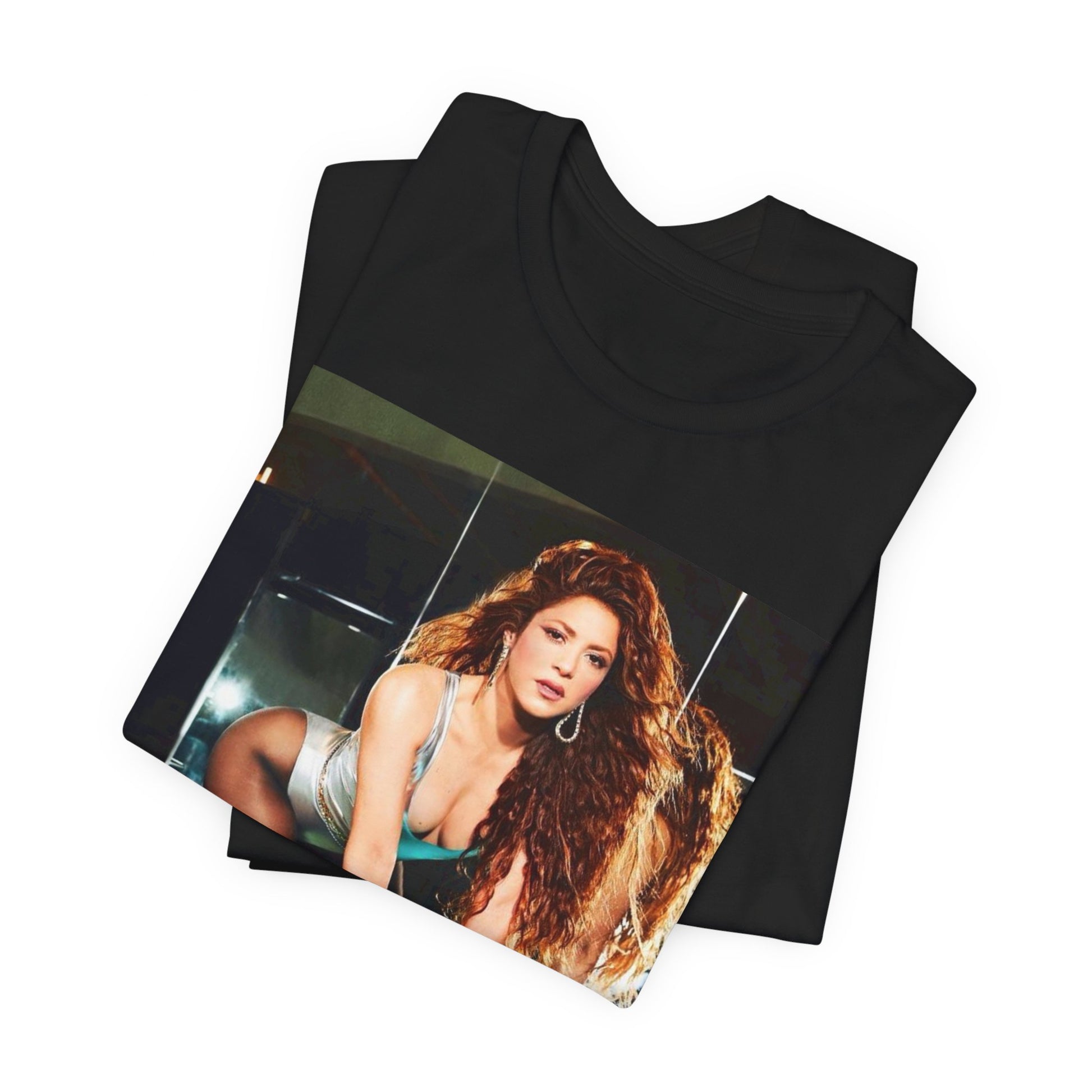 A black graphic t-shirt featuring an iconic fashion pop star graphic of Shakira.