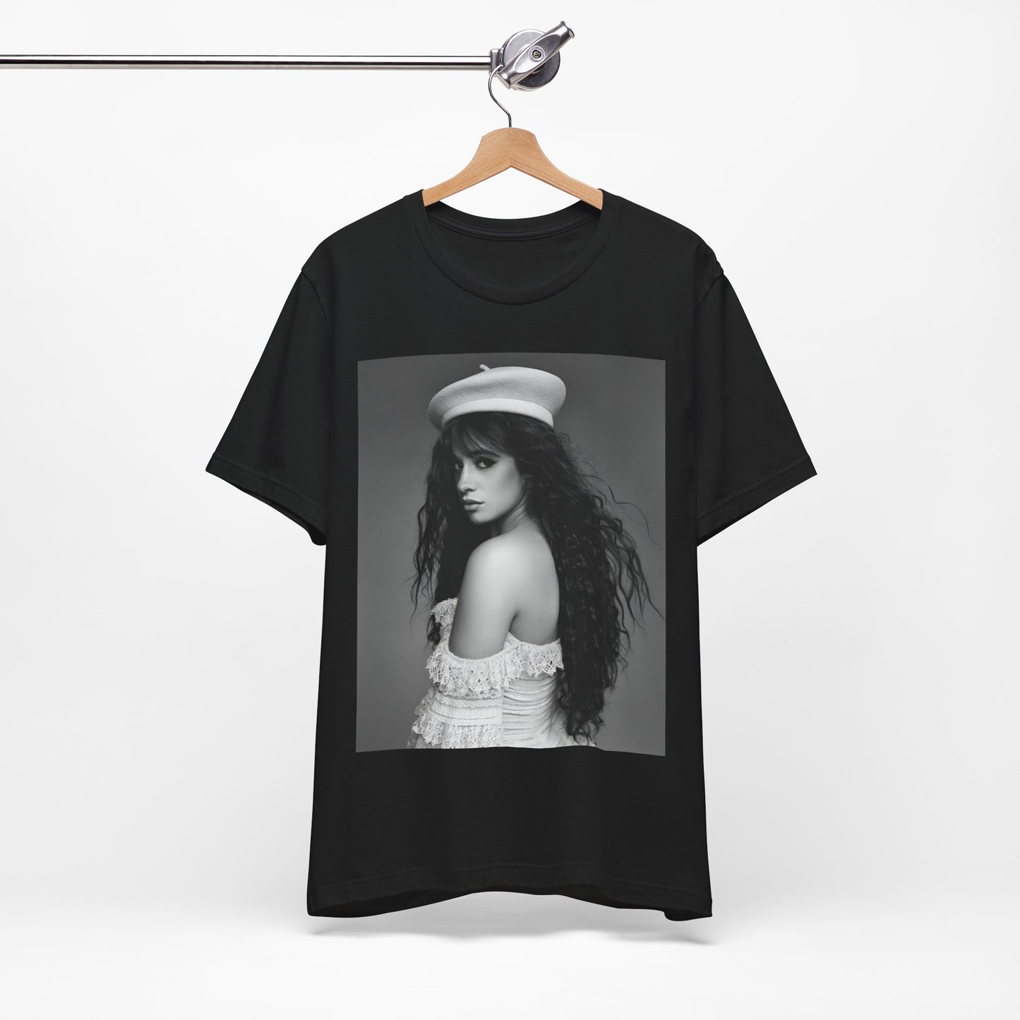 A black graphic t-shirt featuring a black and white graphic of Camila Cabello as a fierce Latina pop star.