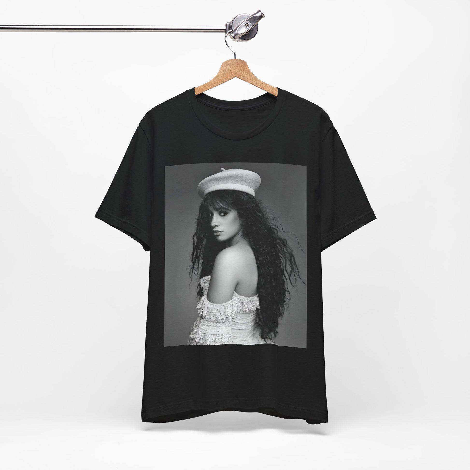 A black graphic t-shirt featuring a black and white graphic of Camila Cabello as a fierce Latina pop star.
